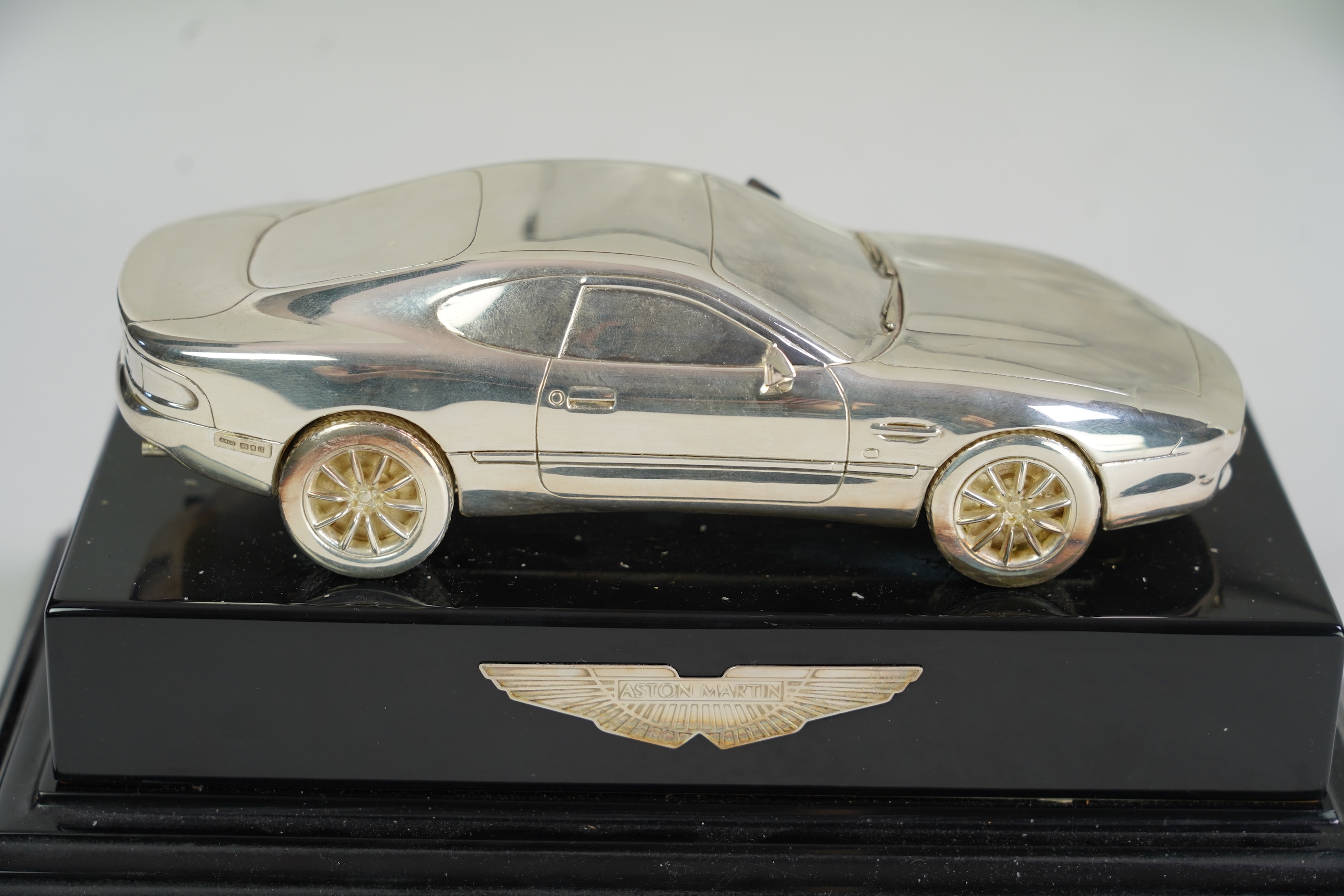 An Elizabeth II miniature silver model of an Aston Martin DB7 Vantage, by Aston Martin Lagonda Design Ltd